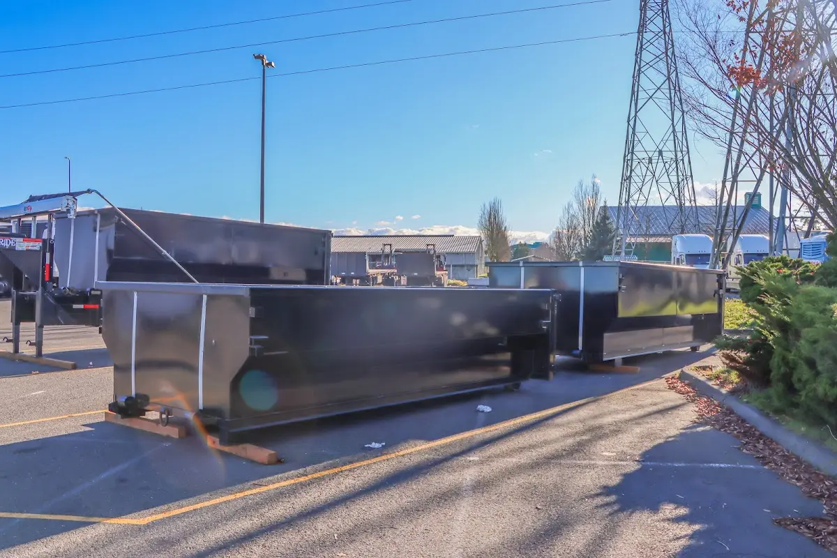 Roll-off dumpster ready for waste disposal at job site for 2 Yard Dumpster Rental in Norfolk